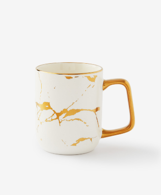 tazza marmorizzata bianca e oro