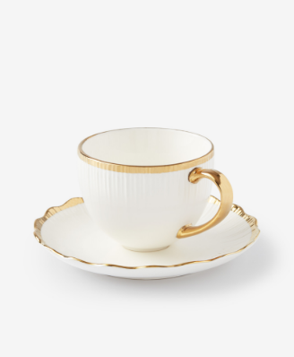 tazza in ceramica bianca e dorata