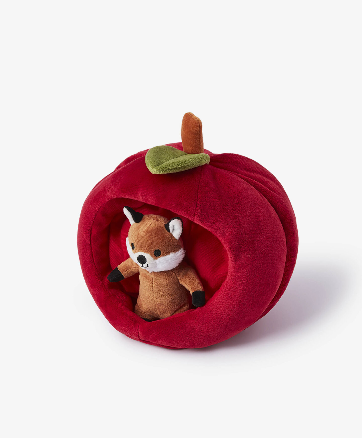 volpe di peluche con mela rossa