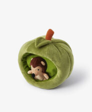 riccio di peluche con mela verde