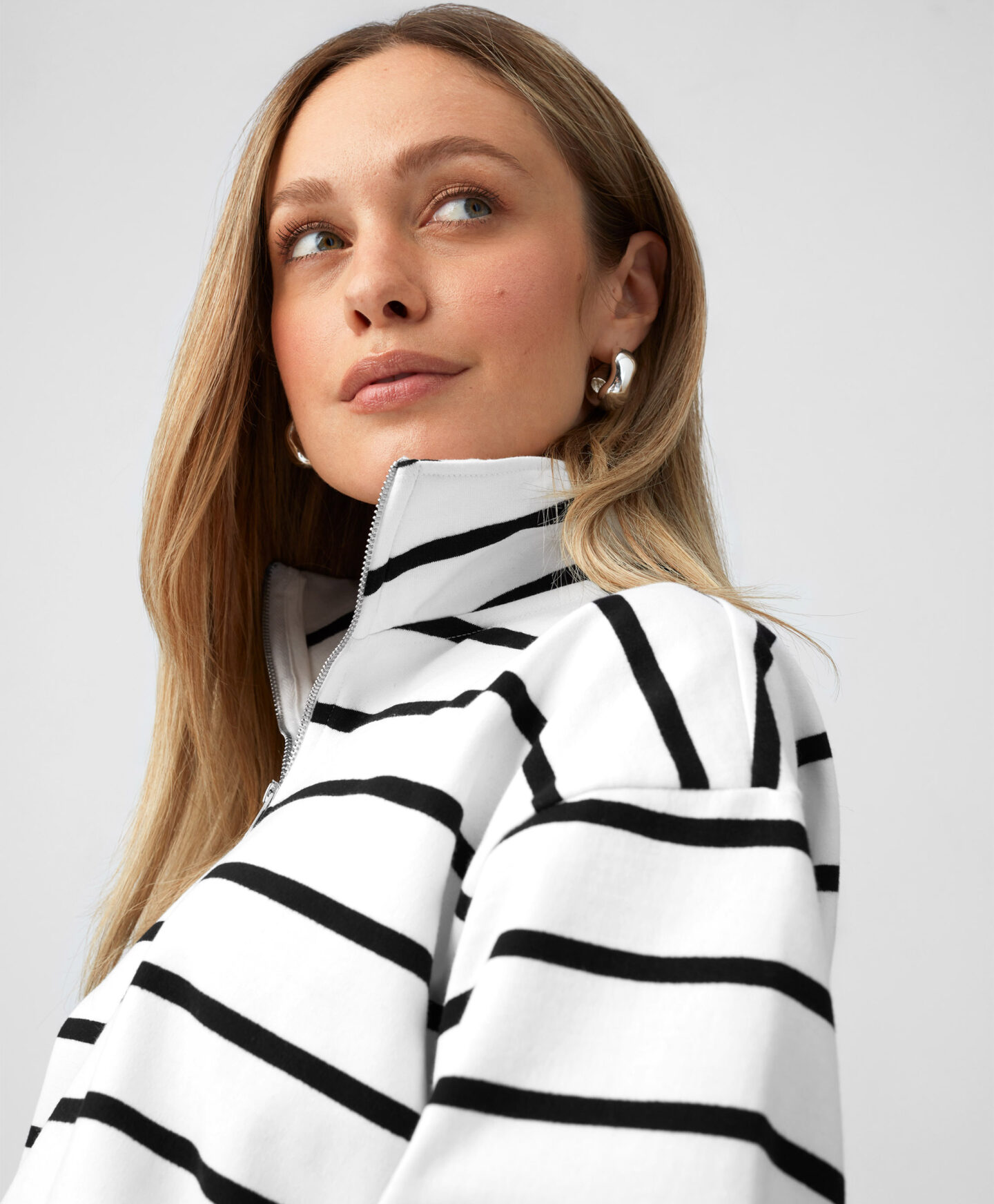 felpa a righe zip sul collo donna