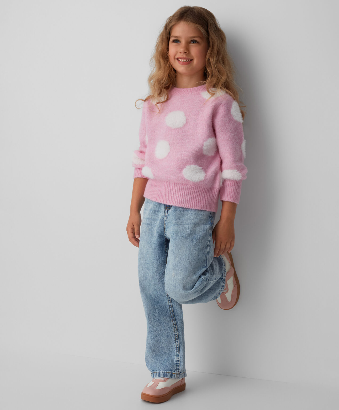 maglione rosa a pois da bambina