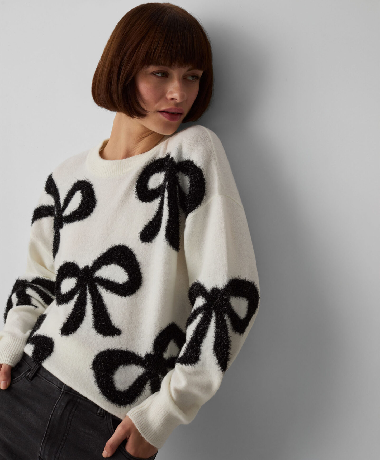 maglione con fiocchi da donna