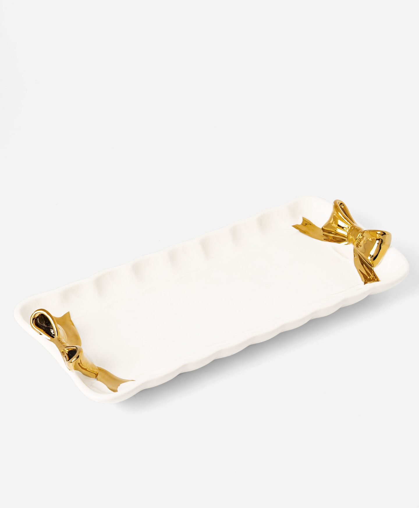 vassoio con fiocchi dorati